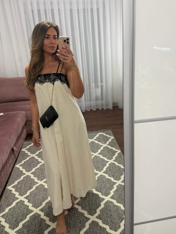Savrsen model lanene haljine sa detaljima od cipke koji je podizu na visi nivo