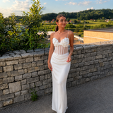 Elegantna bijela maxi haljina s korzetom i cvjetnim detaljima. - slika 2