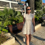 Elegantna bijela čipkana haljina s volanima – romantični ljetni model ✨ - slika 1